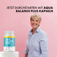Thumbnail for Lächelnde Frau vor rosa Hintergrund, Dose Aqua Balance Plus, Text Jetzt Durchstarten mit Aqua Balance Plus Kapseln