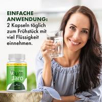Thumbnail for Frau hält ein Glas Wasser neben Burn Jaro Premium mit Einnahmehinweis zu 2 Kapseln täglich morgens