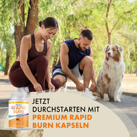 Thumbnail for Sportliches Paar mit Hund im Park, unten Dose Premium Rapid Burn und sichtbarer Werbetext im Bild