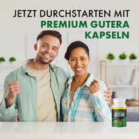 Thumbnail for Lächelndes Paar mit Premium Gutera Kapseln und Slogan zum Durchstarten auf heller Wohnszene