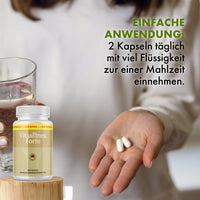 Thumbnail for Vitaslimex Forte Dose, Person hält zwei Kapseln; Einnahmehinweis: 2 Kapseln täglich mit Flüssigkeit