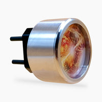 Thumbnail for Silberfarbenes Steckgerät mit rundem Gehäuse, schwarzem Steckerteil und farbigem Kreismotiv